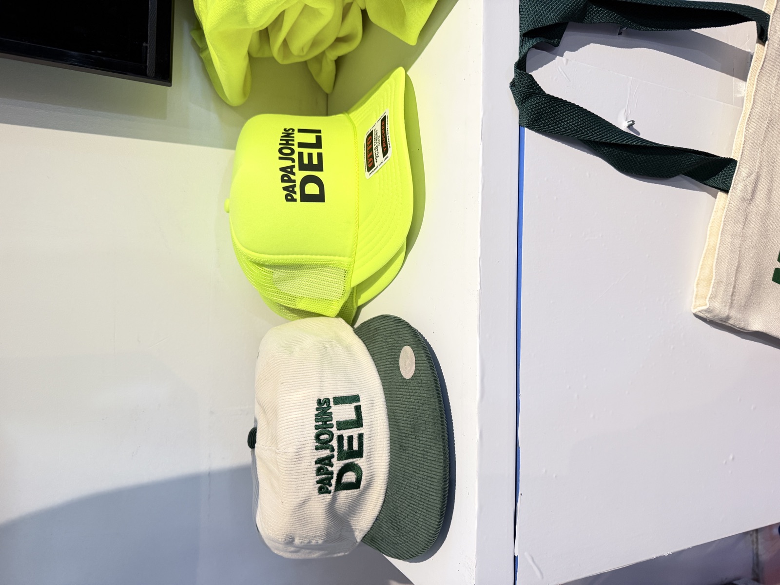 Finished shirts, hats, patches, and event merch for Mobile Merch Printing